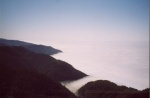 Climbing above the fog.  That inlet is Buck Creek, our campsite that morning.